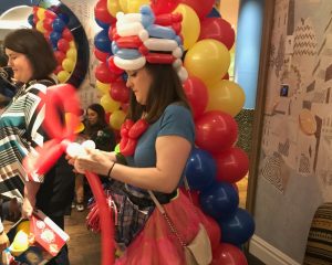 Lady making balloon animals at the event