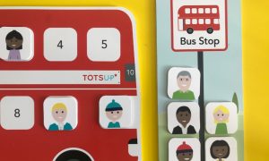 A close up of the TOTSUP Red Bus Reward Chart