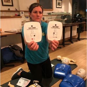 Carolyn with the defibrillator pads