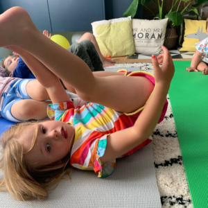 The children doing yoga