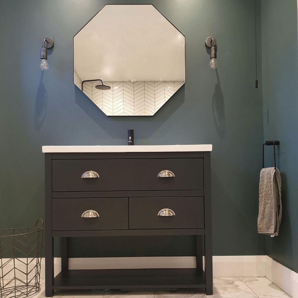 The completed bathroom with sink vanity unit