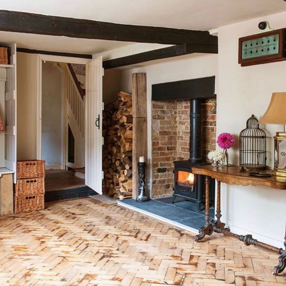A beautiful fireplace with restored floor. 