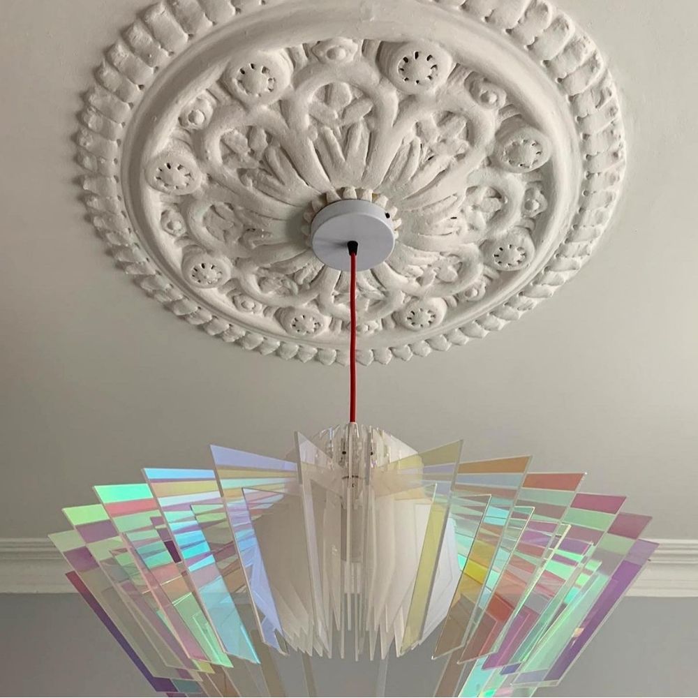 A beautiful light in Katie's living room with ceiling rose