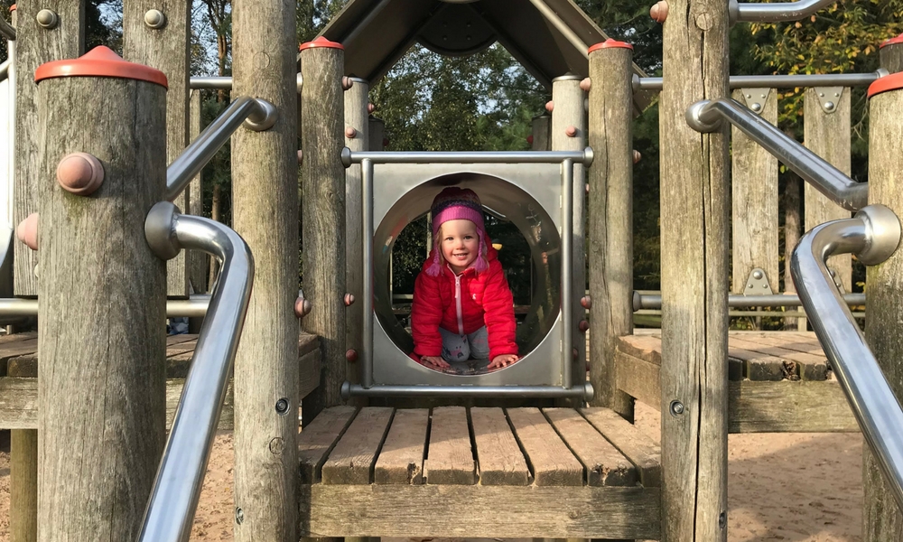 Playing on the climbing frame at Center Parcs Sherwood Forest